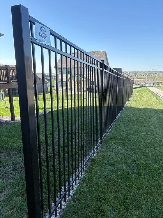 Black iron fence extended property run by fence contractor Bellevue, NE Black iron fence extended property run by fence contractor Bellevue, NE