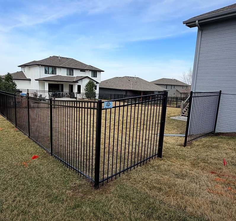 Get a free estimate — fence contractor Bellevue, NE Black ornamental iron fence installed in Bellevue, Nebraska by Taylormade Fence LLC